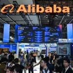 The Alibaba booth during the World Artificial Intelligence Conference in Shanghai in July.Photographer: Hector Retamal/AFP/Getty Images | Sumber: Photographer: Hector Retamal/AFP/Getty Images